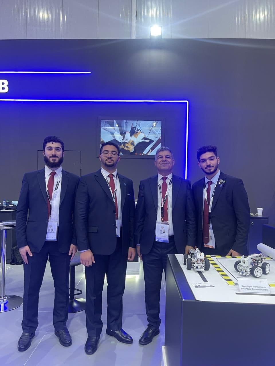 S2VC project group beside the vehicular communications testbed at SOFEX 2024